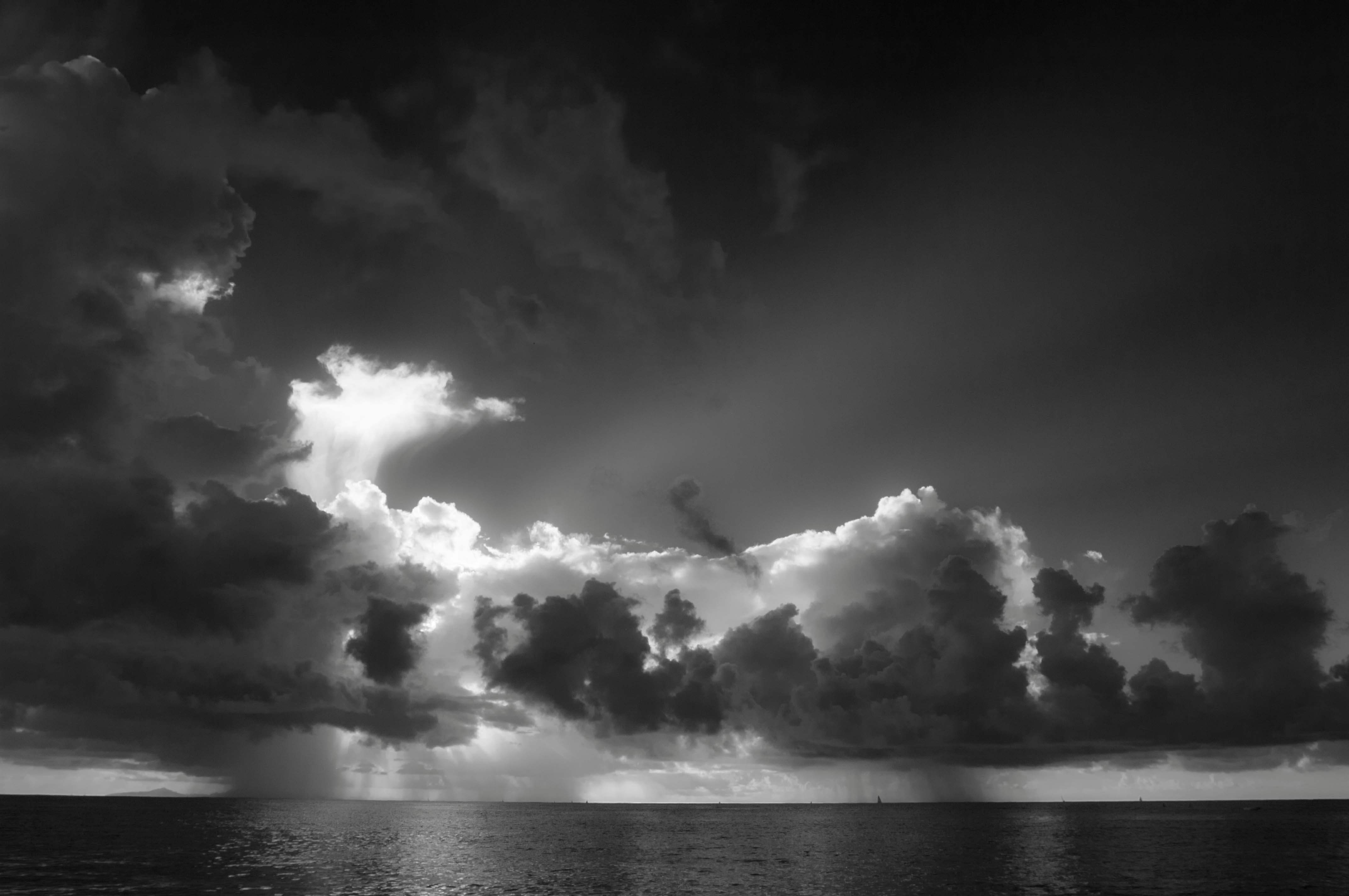 Dramatic clouds over the empty expanse of the Pacific Ocean